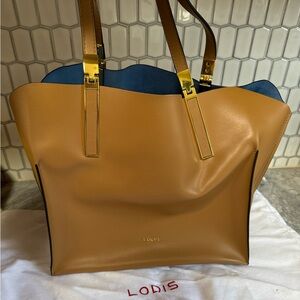 NWT Lodi’s nutmeg leather satchel. With dust bag.